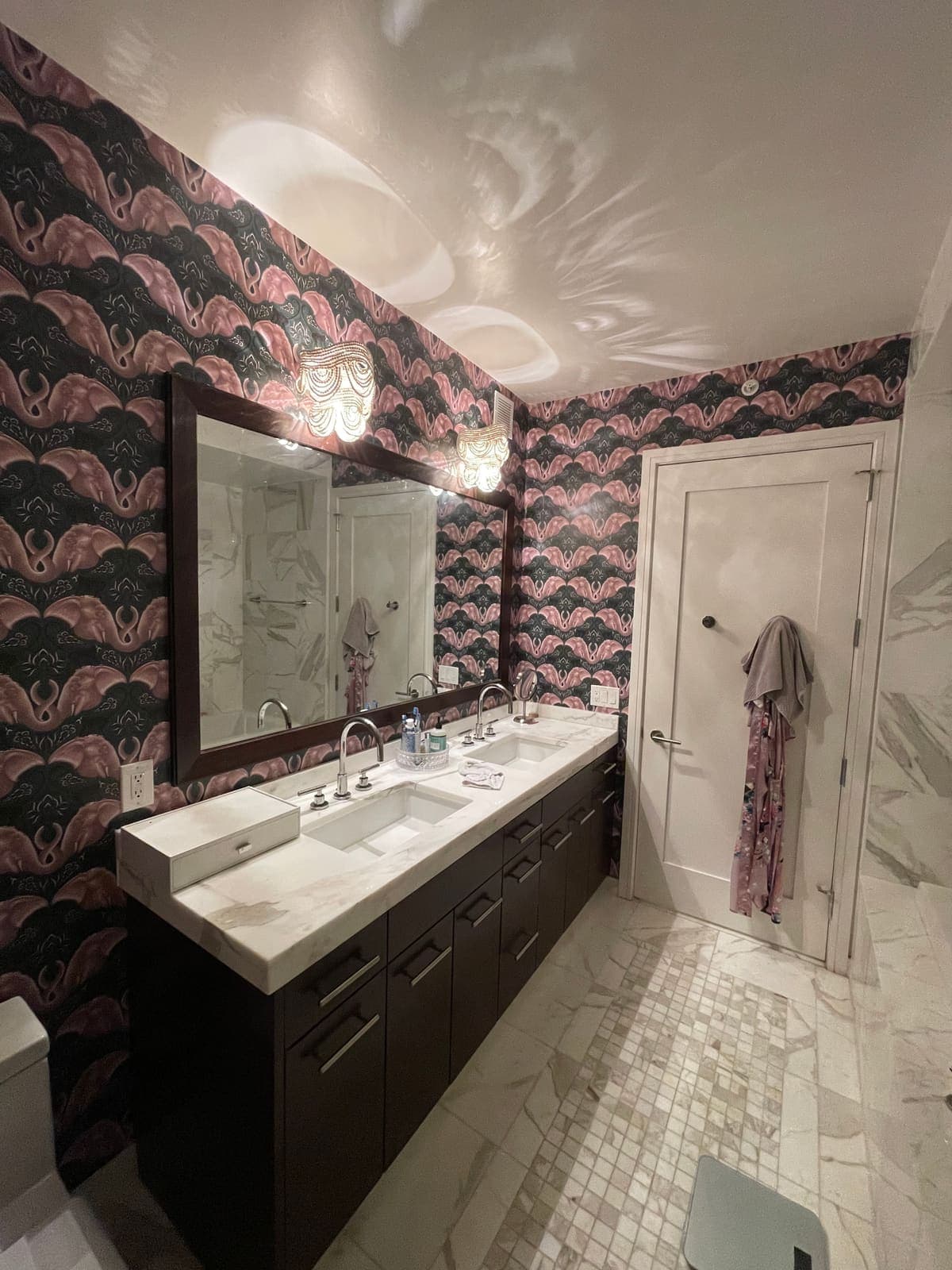 Bold patterned wallpaper installed in a Philadelphia bathroom