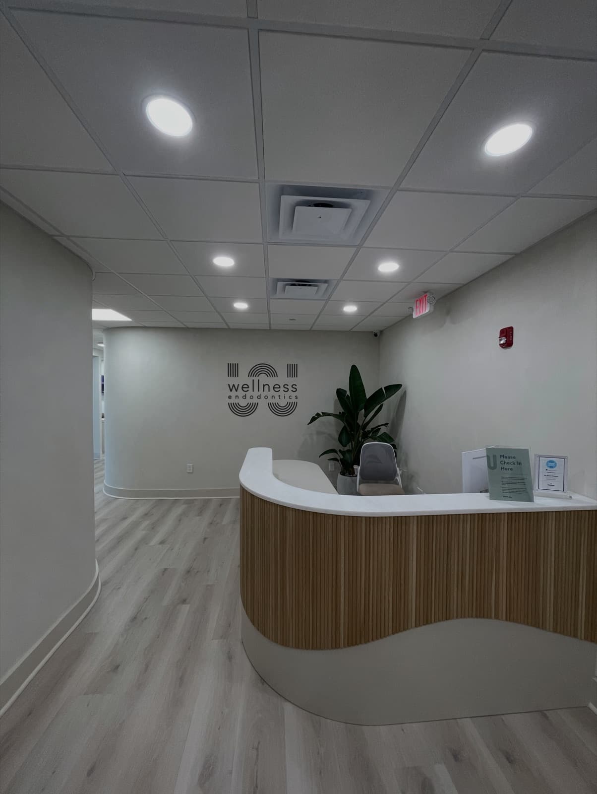 Freshly painted reception area of a Philadelphia endodontics office with the practice logo on the wall