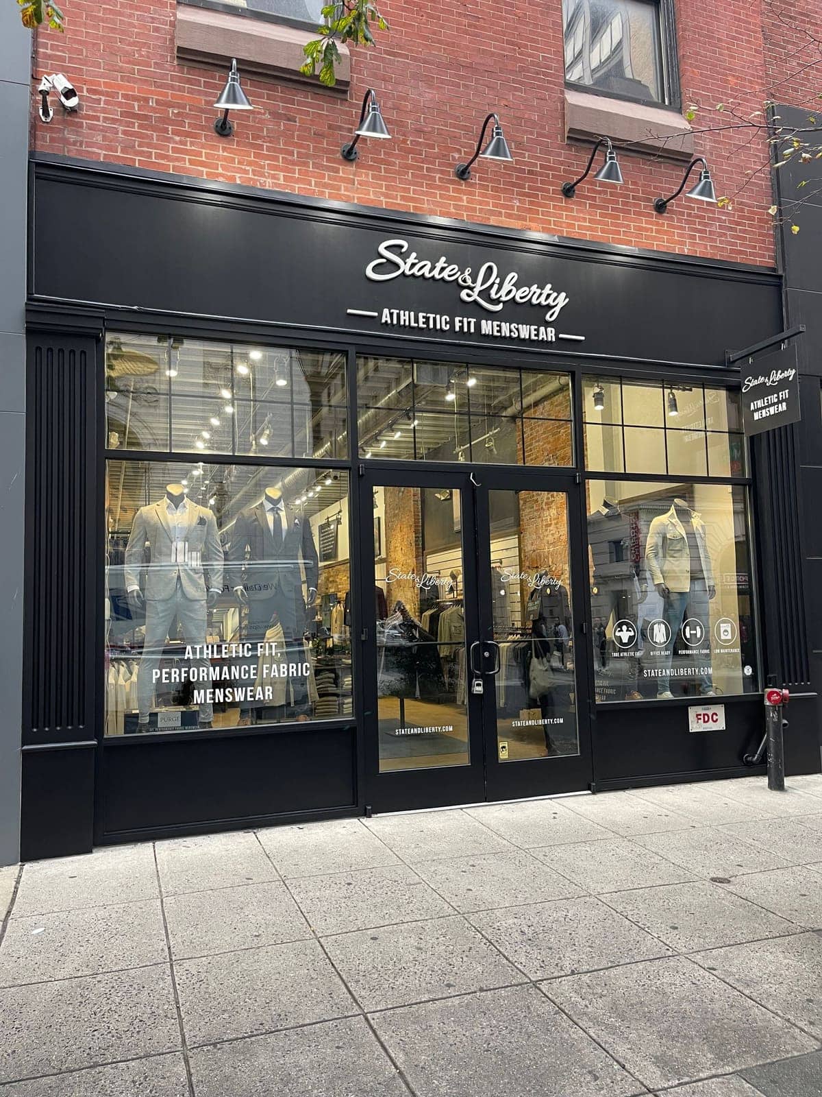 Painted black storefront of a Philadelphia retail shop