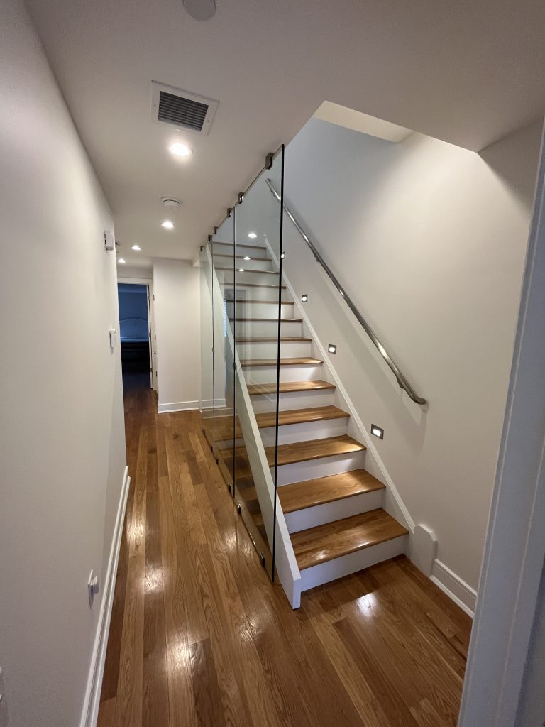 freshly painted entry way with a staircase